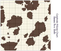 a cross stitch pattern with brown and white flowers on the bottom half of it,