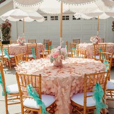 the tables are covered with pink and green ruffled cloths for an elegant look