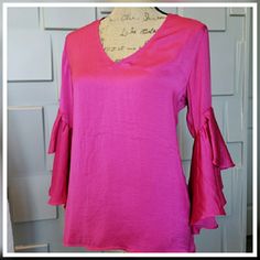 So Fun And Yet So Pretty Is This Vibrant Hot Pink Blouse. Easy Pull Over Style. V Neck. Darling Ruffled 3/4 Sleeves. Beautiful Cond. Never Worn. Polyester Size Large Feminine Ruffled Blouse With 3/4 Sleeves, Pink Bell Sleeve Tops For Summer, Ruffled 3/4 Sleeve Blouse For Work, Elegant Pink Blouse With 3/4 Sleeves, Chic Blouse With 3/4 Sleeves For Brunch, Flowy 3/4 Sleeve Blouse For Spring, Spring Party Blouse With Half Sleeves, Pink Half Sleeve Blouse For Fall, Ruffled 3/4 Sleeve Tops For Work