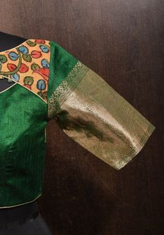 Buy Pure Raw Silk Blouse in Emerlad Green With Kalamkari Yoke Cutout Pattern Online in India - Etsy Festive Tussar Silk Blouse With Kalamkari Print, Tussar Silk Green Blouse, Transitional Anarkali Blouse With Kalamkari Print, Navratri Brocade Blouse With Cutdana, Fitted Tussar Silk Blouse With Cutdana, Designer Art Silk Blouse With Kalamkari Print, Semi-stitched Cotton Silk Blouse Piece With Kalamkari Print, Traditional Block Print Choli For Designer Wear, Green Tussar Silk Blouse For Festivals