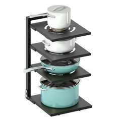 three shelves holding pots and pans on top of each other