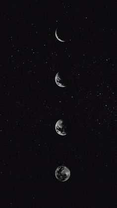 three phases of the moon are shown in black and white, with stars above them