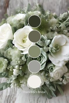 a bridal bouquet with white roses and greenery in shades of gray, green