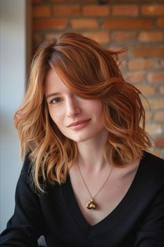 Voluminous feathered shag haircut for medium hair with heavy layers, enhancing natural texture for a playful, carefree style Feathered Shag Haircut, Haircut For Medium Hair, Feathered Shag, Heavy Layers, Messy Layers