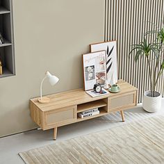 a living room scene with focus on the coffee table and bookshelf in the background