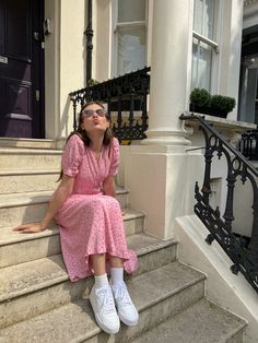 Model sitting on stairs in a Pink Floral Rita Dress, a trendy outfit choice for holiday summer wear. Holiday Outfits Summer, Vibrant Dress, Floral Summer Dress, Romantic Date, Sophisticated Dress, Summer Inspiration, Pink Floral Dress, Pink Colour