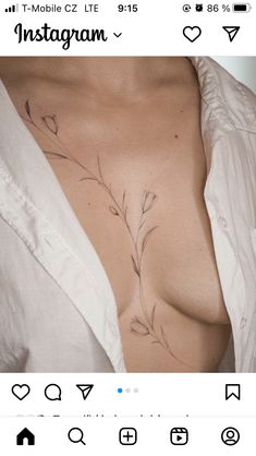 an instagram photo of a woman's chest with flowers on it