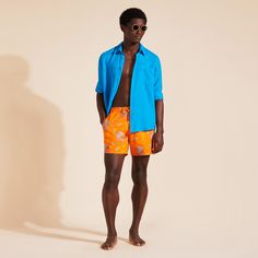 Embroidered men swim trunks, limited productionMen swim trunks with elastic waistband with drawstring and silver tips (engraving 925 certified)Men swim trunks with side pockets and back pocket with Turtle personnalized round snap buttonTwo back eyeletsFully lined with water-resistant mesh lining (100% polyamide)Side leg length in size M: 15.6"Medusa Flowers Men Swim TrunksMen Swim Trunks100% Recycled Polyamide  To take care of your adored men swim trunks, we advise you to follow our suggestions below:Rinse your men swim trunks with fresh water after each use.Wash your men swim trunks at 86F on a delicate program with like colors.Do not use oxygenated or chlorine based bleach/ stain removers.Air-dry your men swim trunks and do not use tumble dryer.It is not necessary to iron it, but if you Orange Beachwear Swimwear With Built-in Shorts, Orange Beachwear Shorts For Poolside, Orange Beachwear Swim Trunks With Built-in Shorts, Fitted Swim Trunks For Vacation Beachwear, Fitted Beachwear Shorts For Vacation, Casual Swim Trunks For Water Polo And Beach Season, Casual Swim Trunks For Water Polo, Fitted Swim Trunks For Vacation Pool, Beachwear Swim Trunks For Water Polo