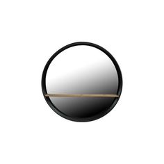 a round mirror with a wooden stick sticking out of it's center, against a white background