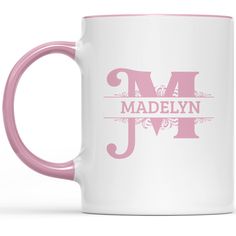 a pink and white coffee mug with the word madelyn on it's side