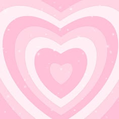 pink hearts are arranged in the shape of a heart on a white and pink background