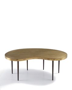 an oval wooden table with two legs and a curved top, against a white background