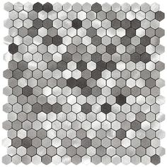 a white and gray tile pattern with hexagonal tiles on it's sides