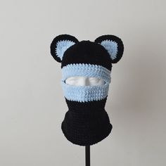 Crochet balaclava hat with bear ears made of velvet yarn with one eye hole in black and blue available for ordering. Color 742 / 749 according to the color chart in the last image.  The first color of the ski mask is black, the second can be selected from the drop-down list to order. Knitted ski mask suitable for men and women. Great to accentuate the style of a street outfit, will be a unique and wonderful gift for a loved one.  Completely handmade.   Sizes: M- 22" - 22 3/8" (55.9 cm-56.8 cm). Blue Balaclava, Knitted Ski Mask, Balaclava Ski Mask, Crochet Balaclava, Hat With Ears, Eye Hole, Velvet Yarn, Velvet Hat, Bear Ears