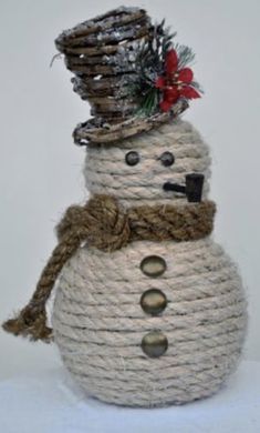 a snowman made out of jute and rope