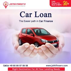 an advertisement for a car loan in the hands of someone holding a small red car