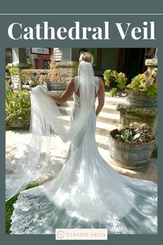 a woman in a wedding dress is standing outside