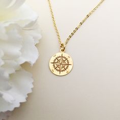 "Personalized COMPASS necklace | gold Compass Necklace | Initial compass necklace | Globetrotter Travel Lover | friendship Compass Pendant This gorgeus gold compass necklace is so dainty! has a compass shaped pendant - all made of gold plated over 925 sterling silver. A beautiful, dainty charm that is engraved very clearly. This wonderful sun compass necklace , is perfect to wear as everyday jewelry or for your special moments. You can combine it with other minimalist necklaces to get the perfec Gold Compass Necklace, Compass Jewelry, Distance Friendship, Long Distance Friendship, Compass Pendant, A Compass, Compass Necklace, Christmas Things, 14k Gold Necklace