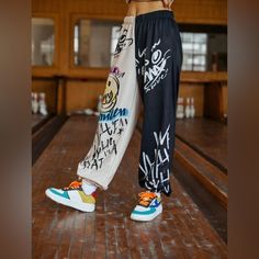 Length: 40.7” Waist Size: 29.1-42.5” Hip Size: 46.9” Thigh: 26.9” Multicolor Patterns Type: Graphic And Colorblock Type: Jogger Length: Long Regular Fit Elastic Waist Closure 95% Polyester 5% Elastane Spring Streetwear Bottoms With Contrast Color, Streetwear Straight Leg Pants With Contrast Color, Casual Bottoms With Contrast Color For Spring, Straight Leg Pants With Contrast Color For Streetwear, White Patchwork Pants For Streetwear, White Color Block Bottoms For Streetwear, Streetwear Cotton Pants With Contrast Color, Contrast Color Cotton Pants For Streetwear, Streetwear Cotton Bottoms With Contrast Color