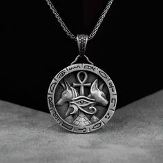 Egyptian Symbols Silver Men Necklace, Eye of Horus and Egyptian Cross Ankh Necklace, Ancient Gift, Anubis and Bast Pendant, Birthday Gift Made of 925 silver and handcrafted by hand, this ring is not only an accessory piece that complements your daily elegance, but also has details that will reflect your character and style. It is also a great gift to give to your loved ones on their special days. At SavisSilver, we always give importance to the satisfaction of our customers, we recommend you to Antique Ankh Jewelry As Gift, Antique Ankh Jewelry Gift, Antique Ankh Shaped Jewelry Gift, Vintage Engraved Ankh Jewelry, Egyptian Men, Egyptian Cross, 3d Pendant, Ankh Necklace, Egyptian Symbols