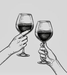 two hands holding wine glasses with red wine