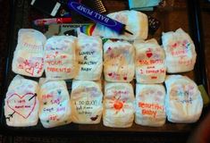 there are many diapers with writing on them