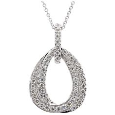 RareGemWorld's classic diamond pendant. Mounted in a beautiful 18K White Gold setting with natural round white diamond melee. This pendant is guaranteed to impress and enhance your personal collection. Total Weight: 0.54cts Length x Width: 25.1 x 16.2 mm Diamond Measurements: 0.77 - 1.49 mm Natural Round White Diamonds 18K White Gold All diamonds are guaranteed natural International Shipments: Please note that customers are responsible for all import duties and taxes applicable to the country of White Gold Set, Contemporary Pendant, Modern Necklaces, Modern Pendant, Yellow Diamond, Drop Pendant, White Diamonds, Modern Jewelry, Diamond Pendant