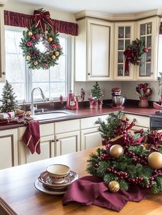 a kitchen decorated for christmas with wreaths and ornaments