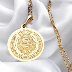 Embrace the spirit of the wild with this stunning Lion King Necklace, a perfect blend of strength and elegance. Handmade with care, this 14K gold necklace features a detailed lion charm, symbolizing power and courage. Its minimalist design makes it a versatile accessory, ideal for everyday wear or as a bold statement piece. 🌼 Handmade Necklace - Made to order 🌼 Colors: Silver / Gold / Rose Gold ���🌼 Materials: 925 Sterling Silver / 14K Solid Gold / 14K Gold Plated FAQ: ✈️Express and Free Shippin Lion Jewellery, King Necklace, Lion Necklace Mens, Lion Gold Pendant For Men, Leo Necklace, Lion Head Necklace, Gold Lion Pendant Jewelry, Lion Charm, Lion Necklace