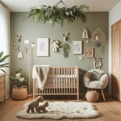 a baby's room with green walls and pictures on the wall