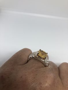 Unusual cut of citrine Sterling silver Setting Handmade Size 7 Can be resized, my jeweler charges a $10 fee All rings are shipped in a nice gift box. Check out our over a THOUSAND great reviews Engraving is $4 per letter and is not always perfect depending on the piece. It can take a few days if the jeweler is busy. This is payable to Paypal Judithsltd@gmail.com Yellow Sapphire Birthstone Ring Gift, Yellow Sapphire Birthstone Ring As A Gift, Yellow Sapphire Birthstone Ring For Gifting, Yellow Sapphire Solitaire Jewelry Gift, Gift Yellow Sapphire Solitaire Jewelry, Silver Yellow Sapphire Rings For Anniversary, Yellow Hallmarked Sapphire Ring Gift, Gift Yellow Hallmarked Sapphire Ring, Hallmarked Citrine Birthstone Ring