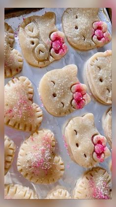 hello kitty hand pies with pink sprinkles on them are ready to be eaten