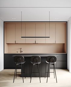 three bar stools sit in front of an island with two counter tops and cabinets