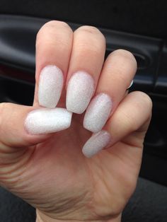 White Shimmer Acrylic Nails, Opaque White Nails With Glitter, White Pearlescent Acrylic Nails, White Nails With Iridescent Glitter, Shimmery White Almond Nails, Milky White Glitter Nails, White Sparkle Nails, White Glitter Nails, Coffin Nails Matte