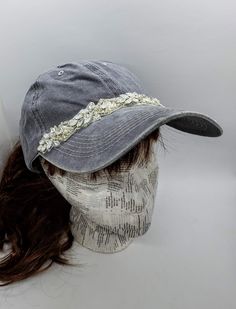 This is a new product from Handmade MKE! This is a distressed gray one size fits all baseball cap with a hole for your ponytail in the back, it is also adjustable. On the front of the hat is band of clear rhinestones, marquise opal stones, sequins and beads. On the brim of the hat are three more opals and a single circular rhinestone. This is very comfortable, and great to throw on with a plain white T-shirt! Like our Facebook Page and get 10% off when you message me before checkout! Everything Adjustable Silver Cap, Silver Adjustable Cap, Adjustable Rhinestone Baseball Cap With Curved Brim, Adjustable Brimmed Gray Baseball Cap, Adjustable Silver Snapback Baseball Cap, Adjustable Silver Baseball Cap, Silver Adjustable Snapback Baseball Cap, Silver Adjustable Baseball Cap, Adjustable Rhinestone Cap