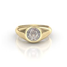 a yellow gold ring with a round diamond in the center, on a white background