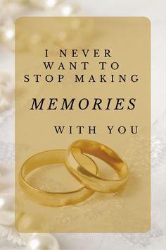 two gold wedding rings sitting next to each other with the words i never want to stop making memories with you