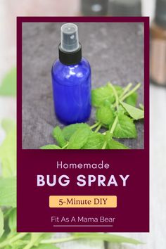 a bottle of bug spray sitting on top of a table next to some leaves and herbs