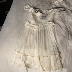 Pretty White Sun Dress I Bought In June Never Worn. Length Is Deceiving It Does Cover Your . Would Love Someone To Actually Get Use Of It ! Summer Ruffle Dress In Off White, Off White Ruffled Summer Dress, Summer Off-white Ruffled Dress, Off-white Spaghetti Strap Beach Dress, Off White Spaghetti Strap Beach Dress, Forever 21 Summer Dress With Spaghetti Straps, Forever 21 Flowy Ruffled Dresses, Flowy Ruffled Dresses From Forever 21, Flowy Ruffled Dresses By Forever 21