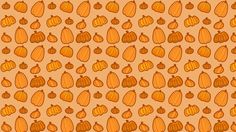 an orange background with pumpkins on it