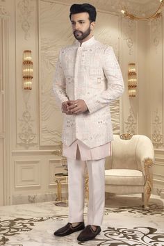 Introducing our R14-S61 Sherwani, the pinnacle of elegance and luxury. Handcrafted with seamless buttons, intricate thread work and shimmering sequins, this garment exudes sophistication and exclusivity. Step into a world of art and fashion with this premium sherwani. Designer Embellished Kurta For Eid, Designer Formal Bandhgala With Mirror Work, Designer Bandhgala With Mirror Work, Designer Bandhgala With Mirror Work For Formal Occasions, Designer Bandhgala With Mirror Work For Formal Events, Designer Embellished Kurta For Festive Occasions, Designer Mirror Work Bandhgala For Formal Occasions, Designer Embellished Festive Kurta, Bollywood Style Festive Sherwani With Sequins