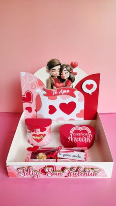 a valentine's day gift box with candy and candies