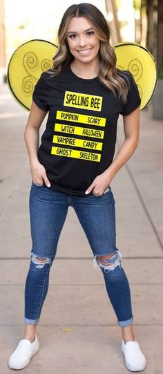 a woman wearing a t - shirt with the words spelling bee on it