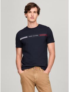 Tommy Hilfiger men's T-shirt. Made from lightweight cotton jersey, known for its breathability and stretch, our comfortable crewneck tee is cut in an easy fit and finished with our Tommy Stripe graphic.  Material: 100% Cotton. Tommy Hilfiger Cotton T-shirt With Text Print, Tommy Hilfiger Graphic Tee With Crew Neck, Tommy Hilfiger Letter Print Crew Neck T-shirt, Tommy Hilfiger Crew Neck T-shirt With Letter Print, Tommy Hilfiger Text Print Cotton T-shirt, Tommy Hilfiger Cotton T-shirt For Summer, Tommy Hilfiger Graphic Tee For Summer, Tommy Hilfiger Summer Graphic Tee, Tommy Hilfiger Sporty T-shirt For Summer