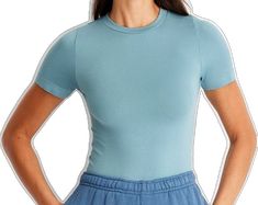 Snug Fit Crew Neck Top For Summer, Seamless Snug Fit Tops For Loungewear, Plain Blue Tops For Loungewear, Blue Plain Tops For Loungewear, Spring Short Sleeve Snug Fit Tops, Seamless Snug Fit Cotton Tops, Snug Fit Seamless Cotton Tops, Snug Fit Short Sleeve Tops For Spring, Fitted Solid Color Top For Loungewear