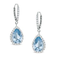 Elegant and dramatic, these exquisite drop earrings will win the heart of the March-born birthday girl. Created in sterling silver, the eye is drawn to the 12.0 x 8.0mm pear-shaped lab-created icy-blue aquamarine center stones, each bordered with a halo frame of shimmering lab-created white sapphire accents. Additional white sapphires line the earring's front. Polished to a brilliant shine, these dazzling drops suspend from and secure with lever backs. Formal Teardrop Bridal Earrings Pierced, Formal Teardrop Pierced Bridal Earrings, Formal Teardrop Bridal Earrings, Formal Sterling Silver Teardrop Bridal Earrings, Formal Teardrop Sterling Silver Bridal Earrings, Evening Fine Jewelry Pear-shaped Earrings, Teardrop Gemstone Bridal Earrings For Formal Occasions, Formal Teardrop Gemstone Bridal Earrings, Elegant Gemstone Teardrop Earrings For Anniversary