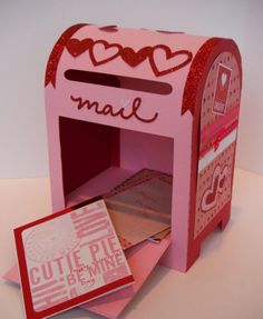 a valentine's day card box with mail inside