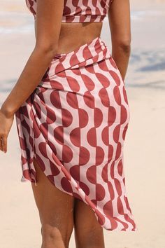 Add a touch of tropical charm to your beach look with our Coral GEO Knotted Sarong. Crafted with vibrant coral hues and featuring a stylish knotted design, it effortlessly elevates your seaside ensemble. Product code: CAA07D4D007JD Features:  Woven Knotted Midi Material: 100%POLYESTER. Beachy Sarong For Vacation, Pink Beachy Swimwear For Summer, Pink Beachy Swimwear For Summer Outings, Casual Orange Swimwear For The Beach, Beachy Sarong For Vacation Beach Season, Pink Beachwear Swimwear For Summer Outings, Chic Pink Swimwear For Summer, Chic Swimwear For Spring And Summer Outings, Chic Swimwear For Summer Outings And Spring