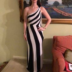 Floor-Length, Beautiful Hugging Black/White Striped Evening Gown, With One Beaded Strap, And Chiffon Shoulder Train, Says Size 4 But Fits More Like A 2. Does Have A Small Stain Under The Left Armpit From Makeup - Not Visible From The Outside While Wearing (See Up Close Photo) Measurements: 55” From Right Underarm 62” From Top Of Single Strap 24” Waist 30” Bust About 9” From Left Underarm To Waist White Evening Gown, Shoulder Training, White Evening Gowns, Beaded Strap, Dress First, Evening Gown, Floor Length, Evening Gowns, White Stripe