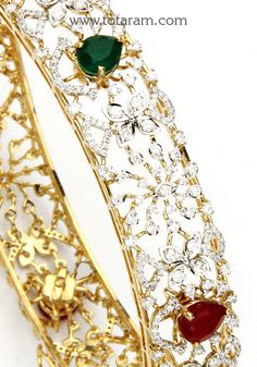 18 Karat Gold Diamond Kada with Color Stones - Single Piece 
  This product has 6 Interchangeable Red & Green Color Stones in the Bangle. 
   Note : This item comes with a clip. so that you can open it and wear it directly on your wrist.    

Introducing our exquisite 18 Karat Gold Diamond Kada with Color Stones - a stunning piece of jewelry that showcases the artistry and craftsmanship of Indian jewelry makers. This single piece bangle is the perfect accessory to add a touch of elegance and gla Diamond Kada, Gold Arm Cuff, Toes Ring Silver, 22k Gold Bangles, Baby Gold Rings, Temple Jewellery Earrings, 22k Gold Earrings, Gold Initial Pendant, Diamond Earrings For Women